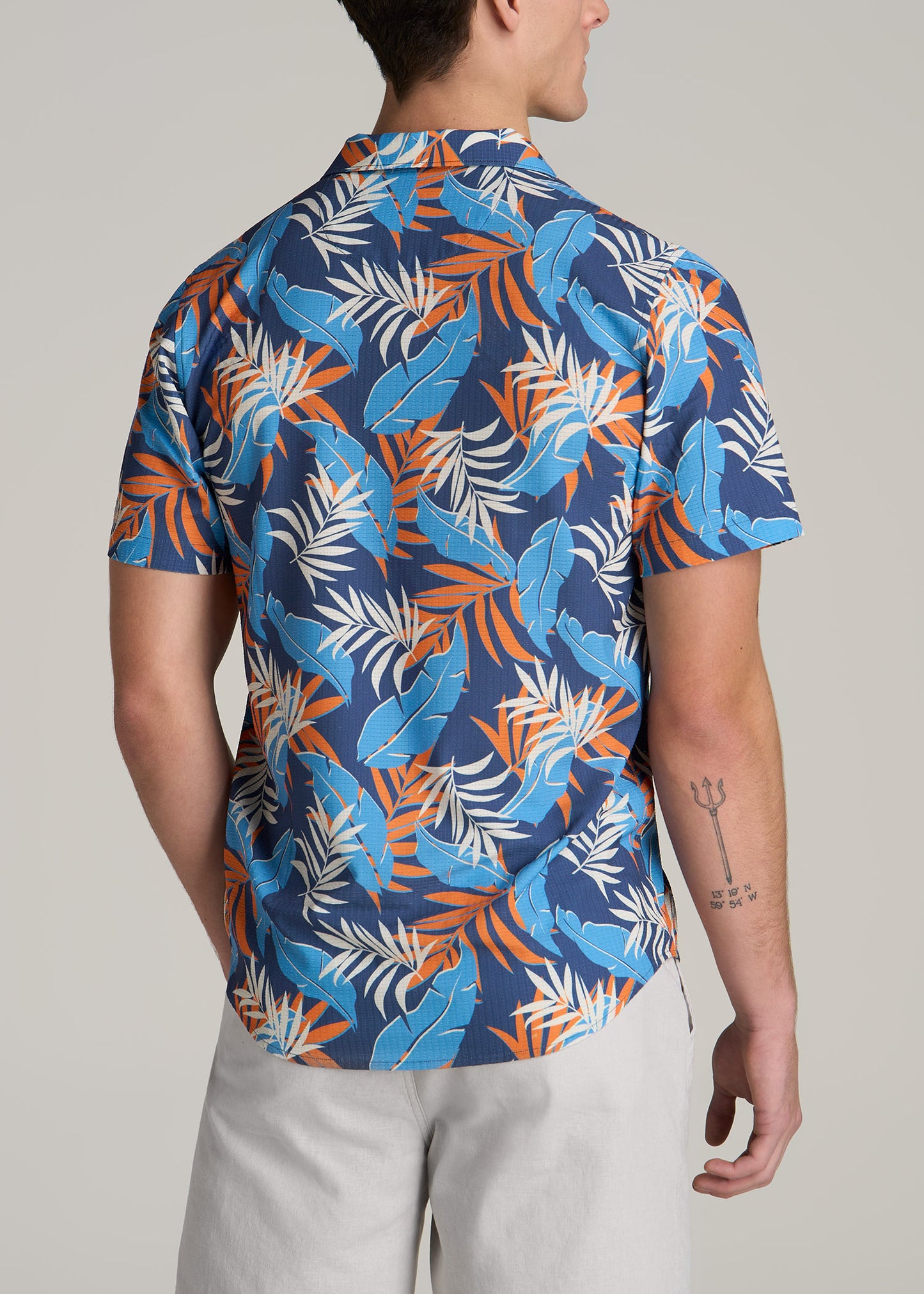 Coastal Perforated Tall Men's Polo Shirt in Blue and Orange Palms