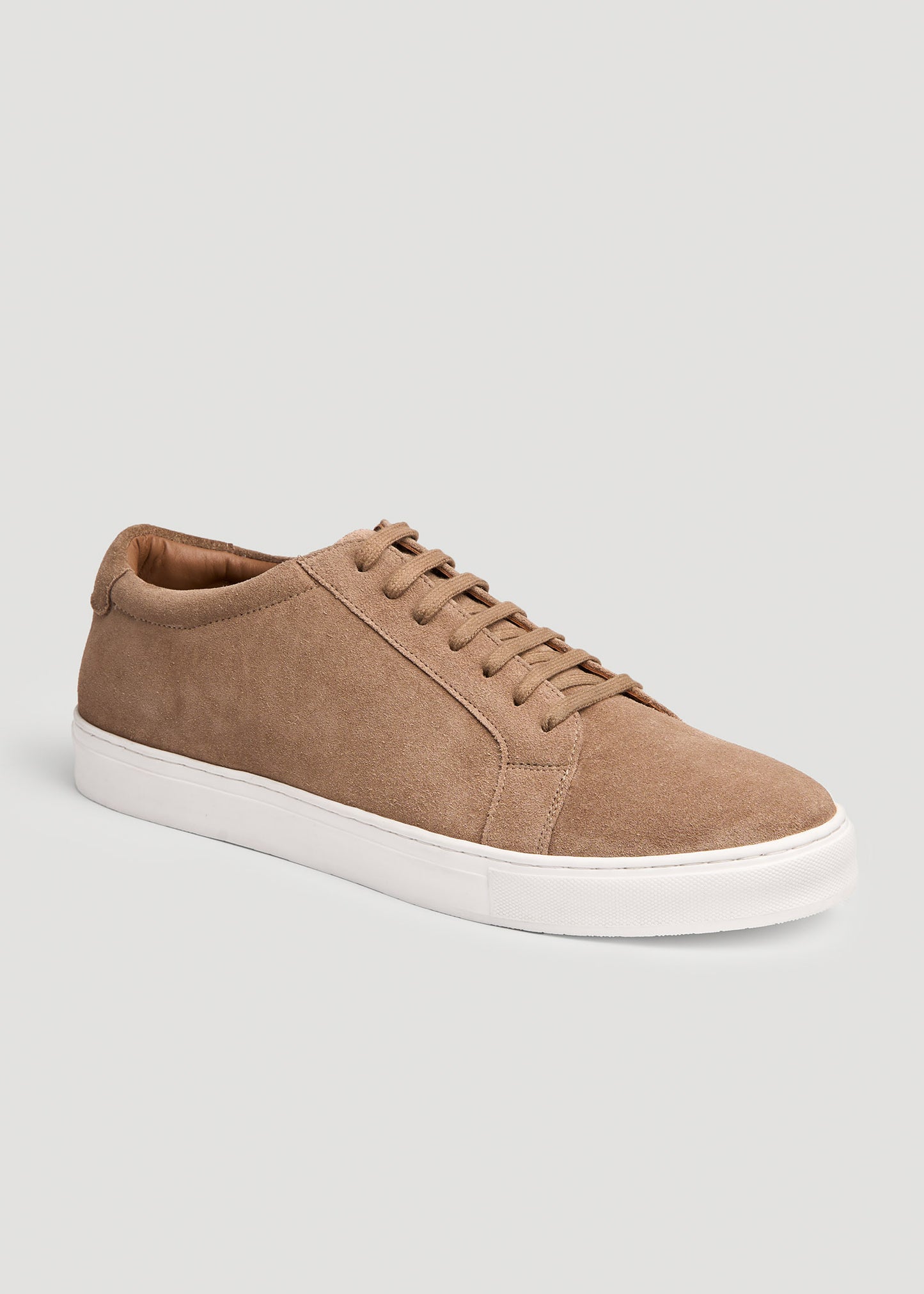 Close-up of American Tall's Cupsole Tennis Sneakers in Taupe Suede.