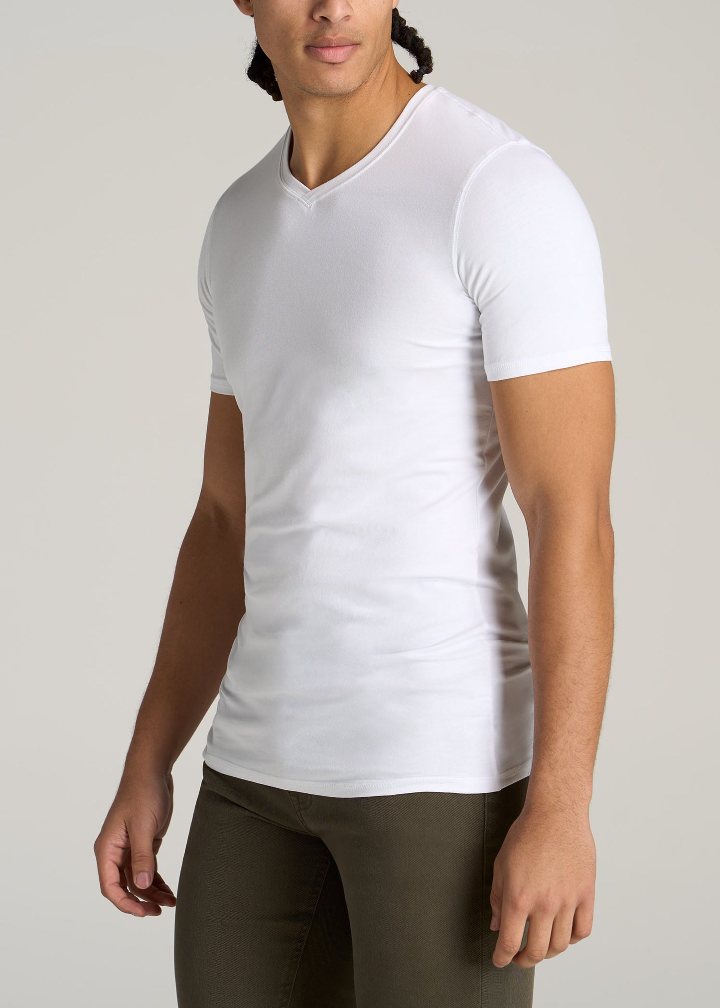 Tall man wearing American Tall's Essential Slim-Fit V-Neck Tee in the color White.