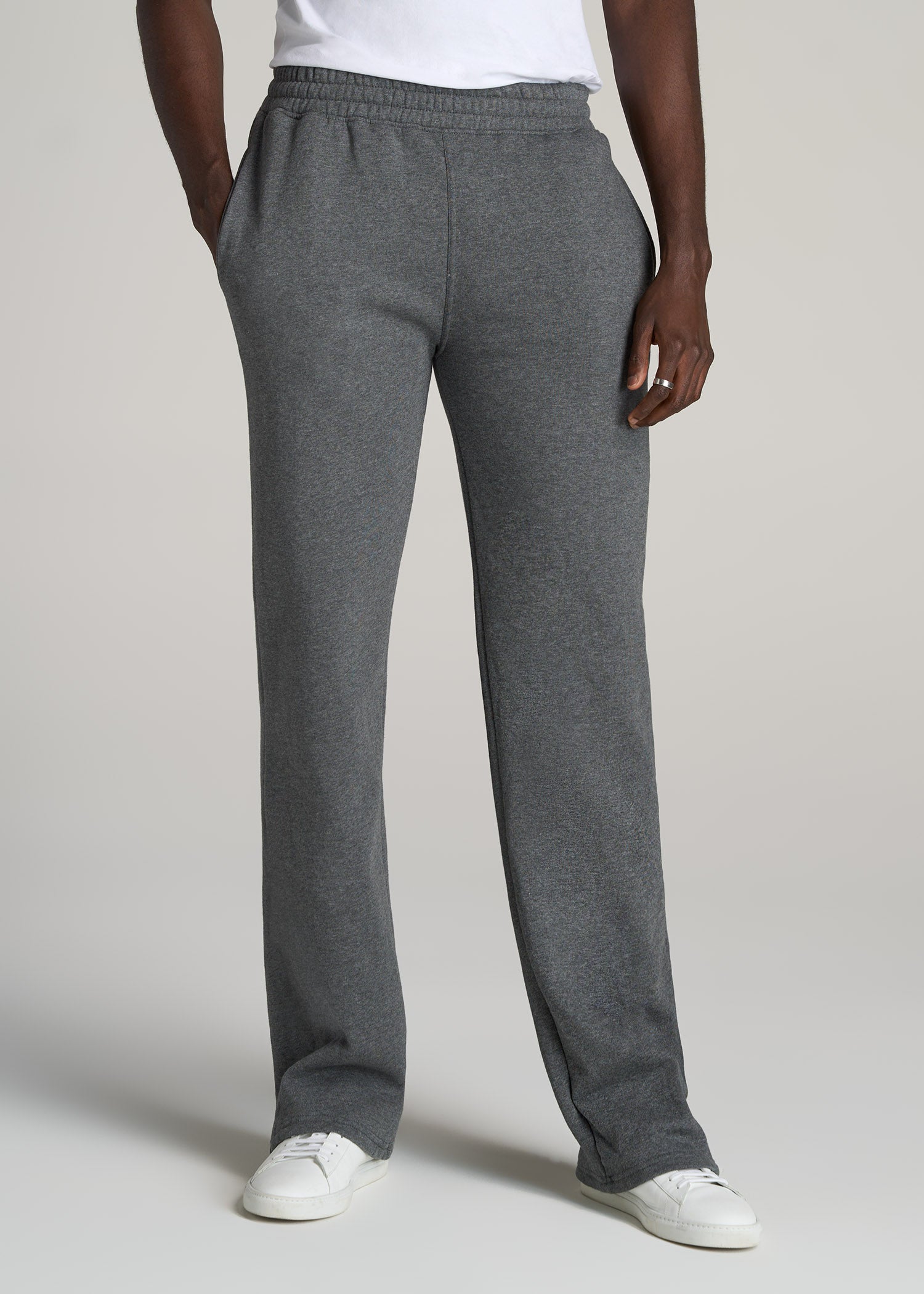 Semi-tall man wearing American Tall's Wearever Fleece Open-Bottom Sweatpants in the color Charcoal.